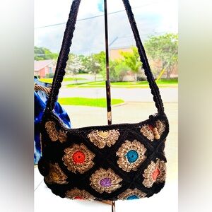 The Sak Dark Brown Crochet Shoulder Bag with Multicolor Floral Circles